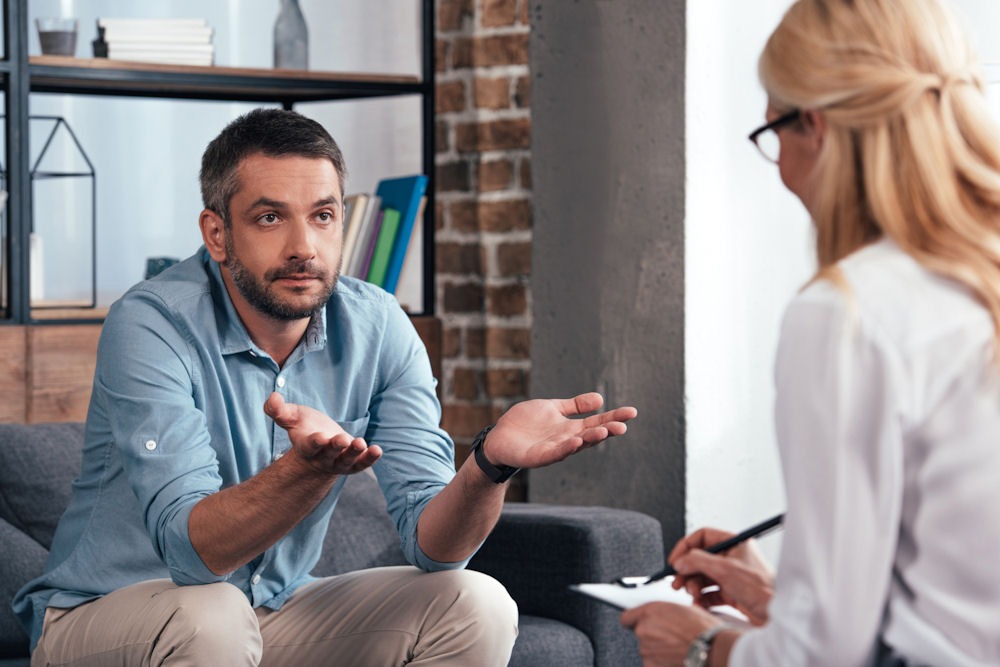Man asking questions of therapist during Individual therapy in Pennsylvania
