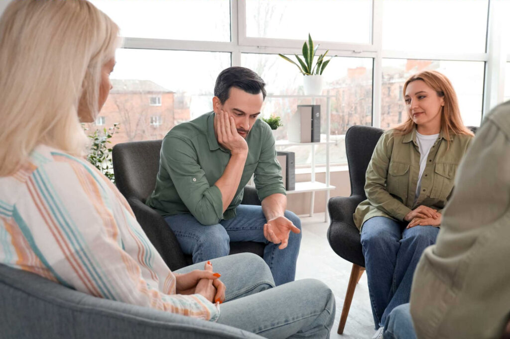 Addiction support group discussing preparation for PAWS